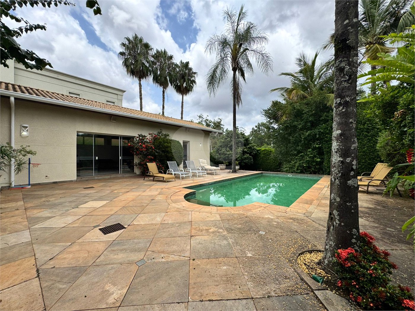 Casa à venda com 5 suítes no condomínio Residencial Bougainville, Campinas - SP