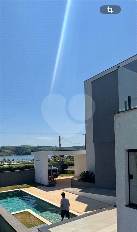 Casa à venda com 5 suítes no condomínio Riviera Santa Cristina Iii, Itaí - SP