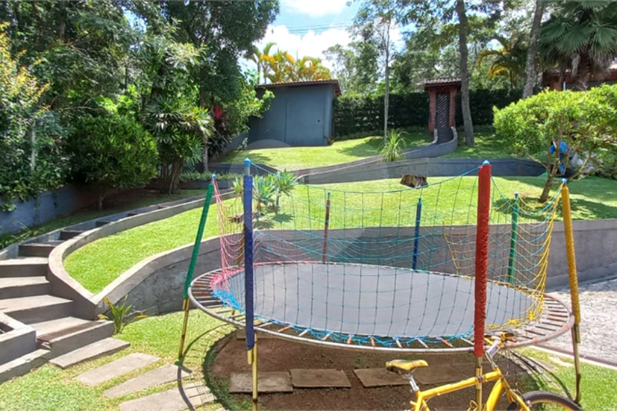 Casa à venda com 4 suítes no condomínio Alpes da Cantareira, Mairiporã - SP