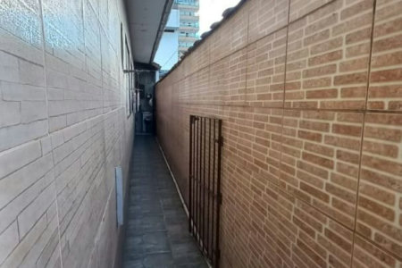 Casa com 2 dormitórios à venda, 100 m² por R$ 700.000,00 - Vila Guilhermina - Praia Grande/SP