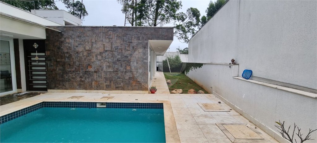 Casa à venda com 5 quartos, sendo 2 suítes, no condomínio Swiss Park, São Bernardo do Campo - SP