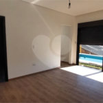 Casa à venda com 4 suítes no condomínio Figueira Garden, Atibaia - SP