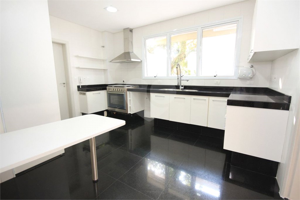 Casa à venda com 4 suítes no condomínio Vila Alba, São Paulo - SP