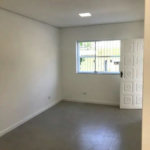 Casa com 3 dormitórios à venda, 116 m² por R$ 690.000,00 - Gonzaga - Santos/SP