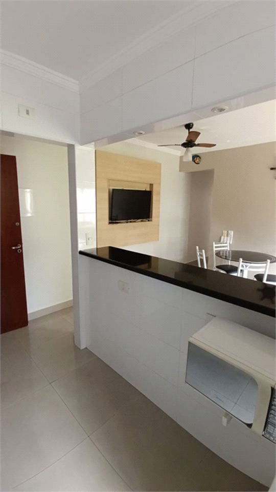 Apartamento com 2 dormitórios à venda, 60 m² por R$ 330.000,00 - Jardim São Miguel - Guarujá/SP