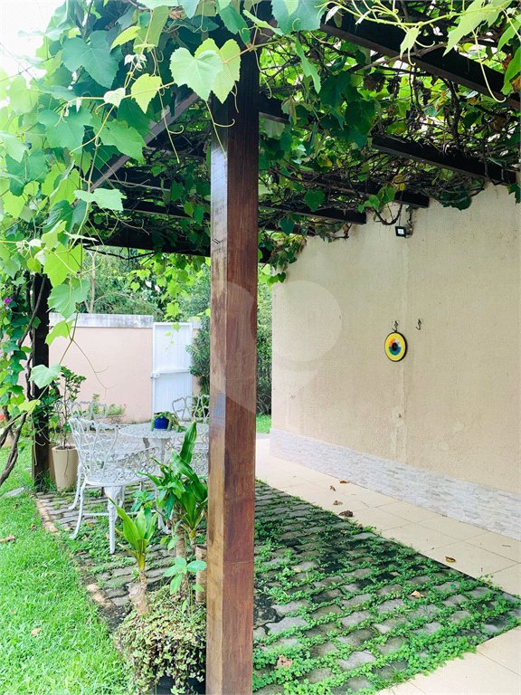 Casa à venda com 4 quartos, sendo 3 suítes, no condomínio Morada da Serra Residencial, Rio de Janeiro - RJ