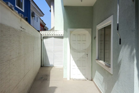 Casa à venda com 4 quartos, sendo 1 suíte, no condomínio Atlantico Sul, Rio de Janeiro - RJ