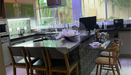 Casa à venda com 4 suítes no condomínio Granja Morumbi, São Paulo - SP