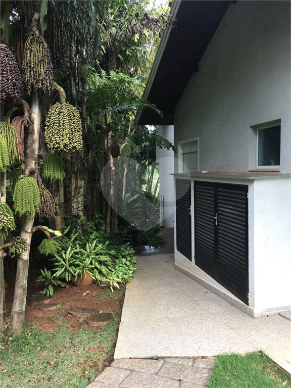 Casa à venda com 4 suítes no condomínio Estância Marambaia, Vinhedo - SP