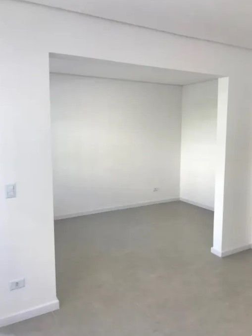 Casa com 3 dormitórios à venda, 116 m² por R$ 690.000,00 - Gonzaga - Santos/SP