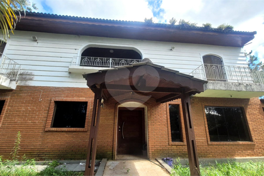 Casa à venda com 4 suítes no condomínio Alpes da Cantareira, Mairiporã - SP