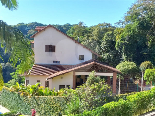 Casa à venda com 4 suítes no condomínio Alpes da Cantareira, Mairiporã - SP