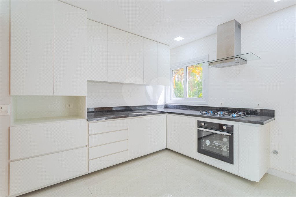 Casa à venda com 4 suítes no condomínio Villagio Quadrifolio, São Paulo - SP