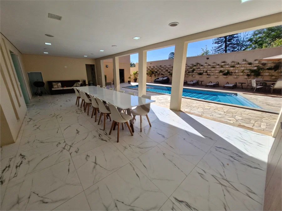 Casa à venda com 4 suítes no condomínio Villa Viana II, Cotia - SP