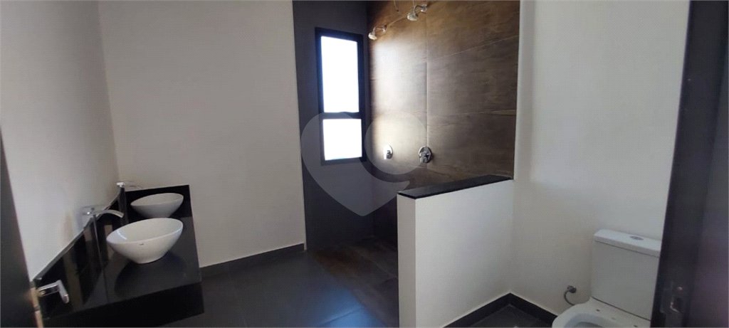 Casa à venda com 4 suítes no condomínio Figueira Garden, Atibaia - SP
