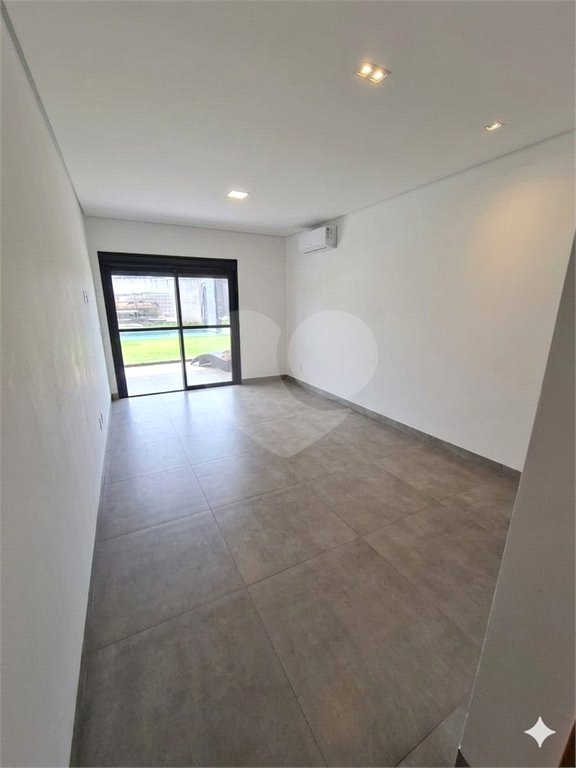 Casa à venda com 4 suítes no condomínio Park Lane, Guarujá - SP