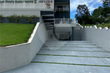 Casa à venda com 4 suítes no condomínio Reserva Ibirapitanga Ii, Santa Isabel - SP