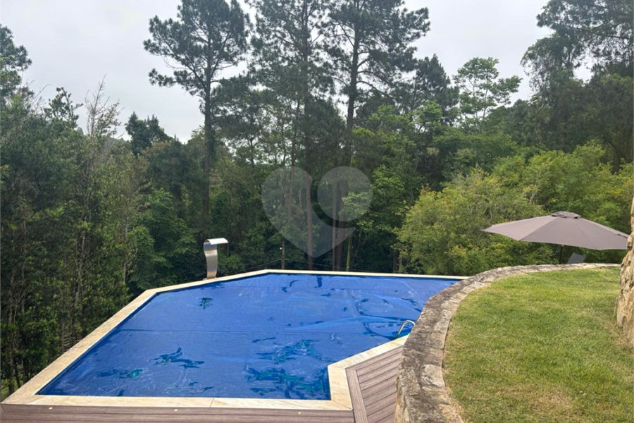 Casa à venda com 4 quartos, sendo 3 suítes, no condomínio Parque Itatiaia, Mairiporã - SP