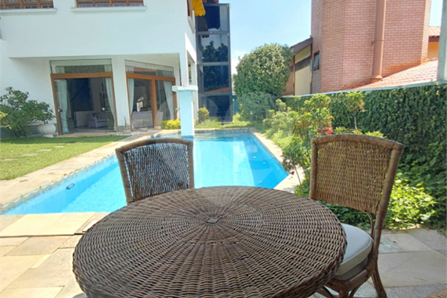 Casa à venda com 4 suítes no condomínio Ville Bourghese, São Paulo - SP