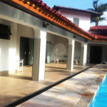 Casa à venda com 8 quartos, sendo 6 suítes,  no condomínio Acapulco, Guarujá - SP