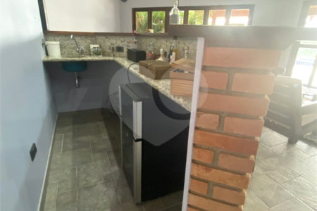 Casa à venda com 4 suítes no condomínio Vale da Santa Fé, Vinhedo - SP