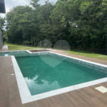 Casa à venda com 4 suítes no condomínio Figueira Garden, Atibaia - SP