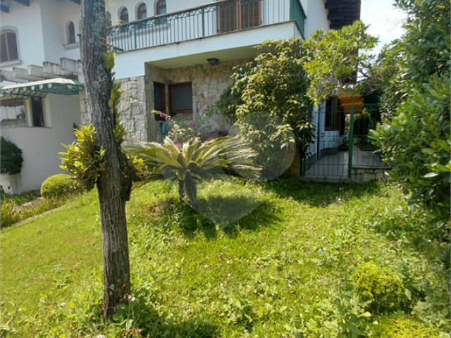 Casa à venda com 4 suítes no condomínio Ville Bourghese, São Paulo - SP
