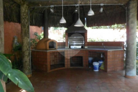 Casa à venda com 4 suítes no condomínio Jardim das Azaléias, São Paulo - SP