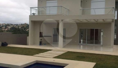 Casa à venda com 4 suítes no condomínio Santa Maria, Cotia - SP