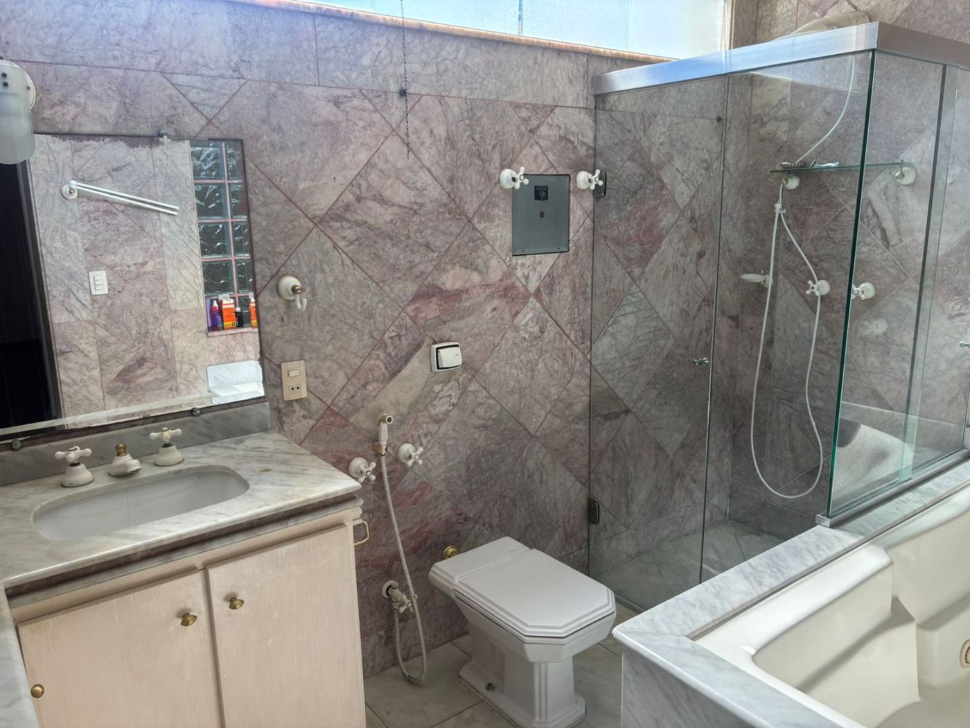 Casa com 3 dormitórios à venda, 330 m² por R$ 2.770.000,00 - Ponta da Praia - Santos/SP