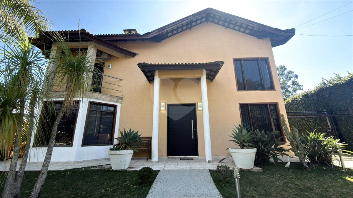 Casa à venda com 4 suítes no condomínio Parque Village Castelo, Itu - SP