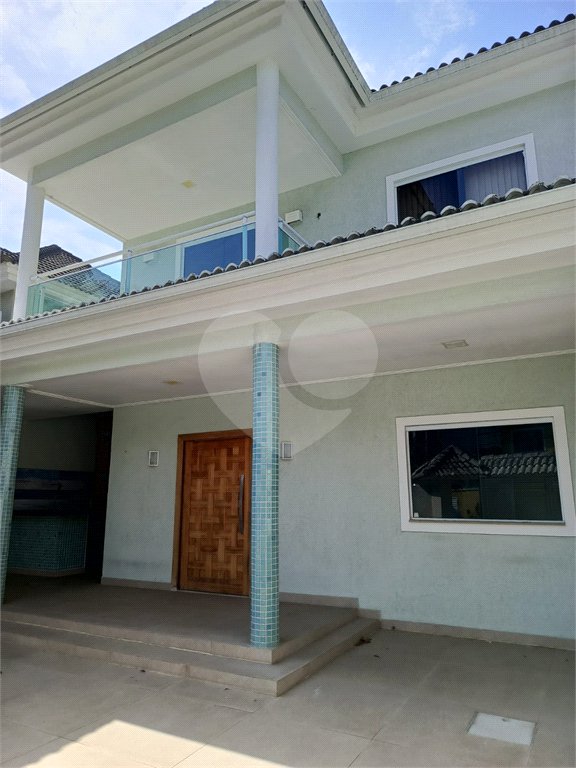Casa à venda com 4 quartos, sendo 1 suíte, no condomínio Atlantico Sul, Rio de Janeiro - RJ