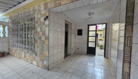 Sobrado com 3 dormitórios à venda, 129 m² por R$ 638.000,00 - Encruzilhada - Santos/SP
