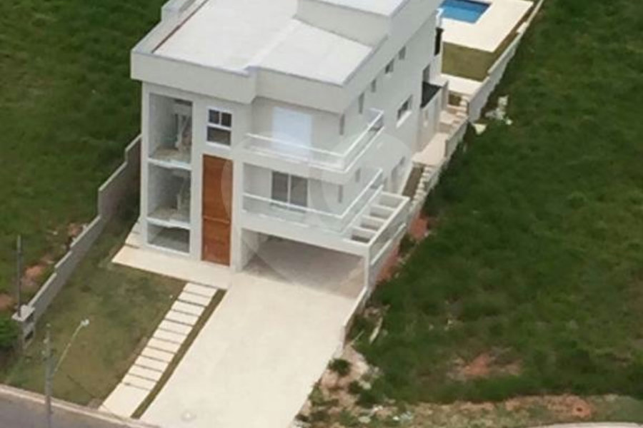 Casa à venda com 4 suítes no condomínio Santa Maria, Cotia - SP