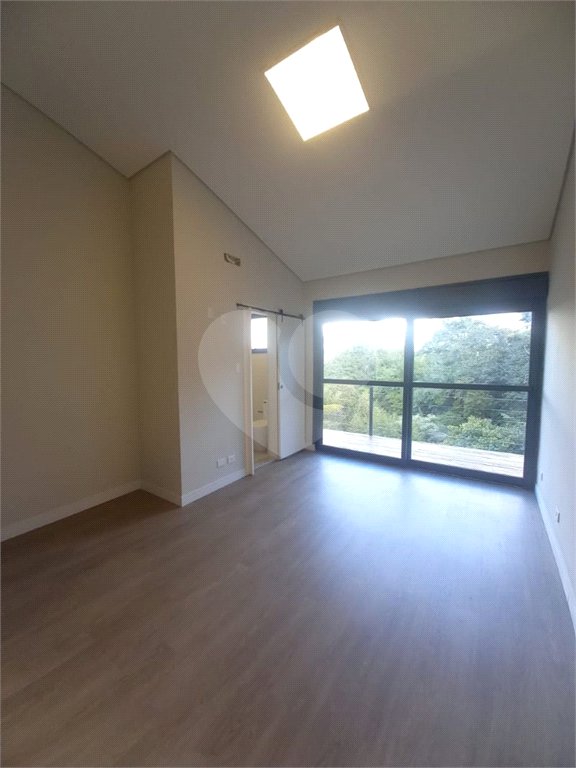 Casa à venda com 4 suítes no condomínio Estância Marambaia, Vinhedo - SP