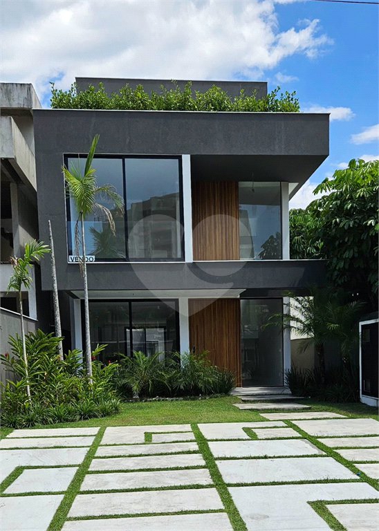 Casa à venda com 4 suítes no condomínio Riomar X, Rio de Janeiro - RJ