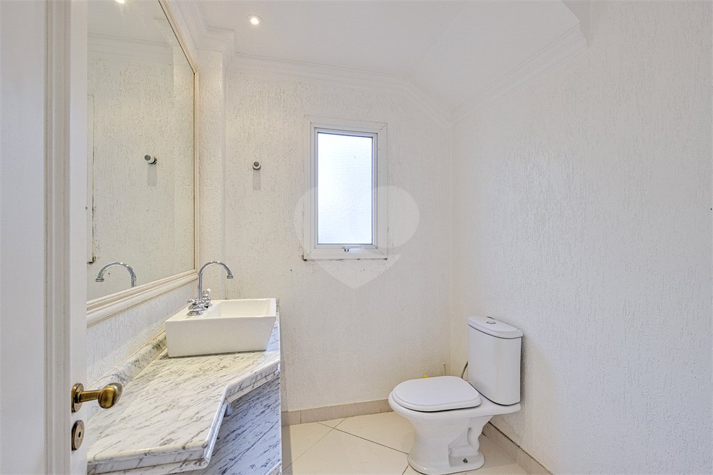 Casa à venda com 4 suítes no condomínio Solar Andaluz, São Paulo - SP