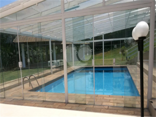 Casa à venda com 4 suítes no condomínio Suíça da Cantareira, Mairiporã - SP