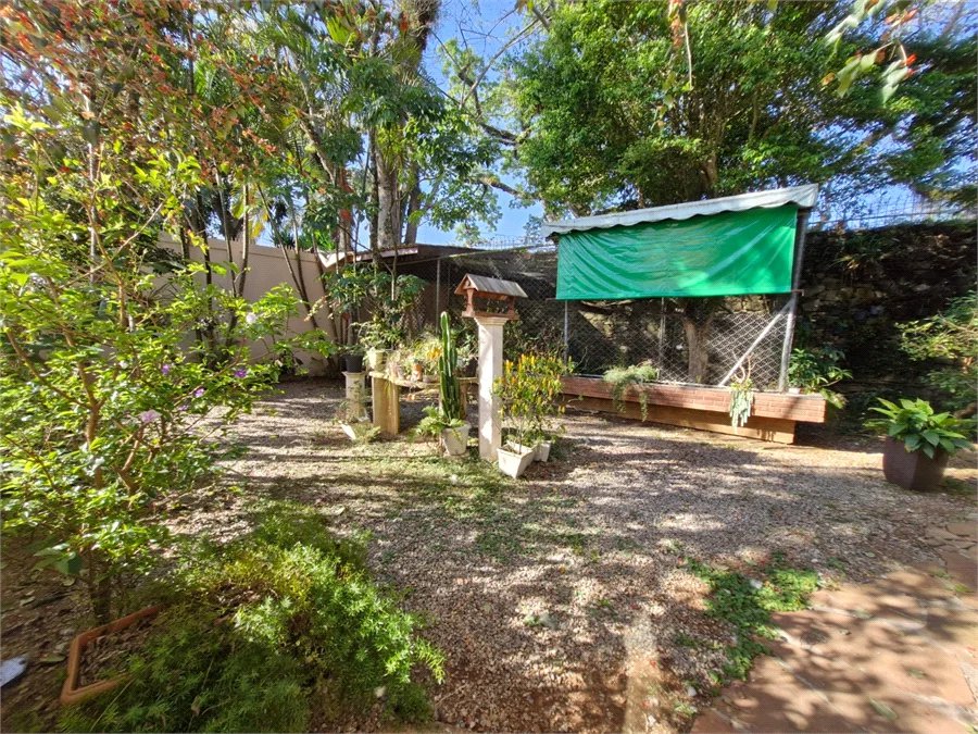 Casa à venda com 4 suítes no condomínio Villa Viana II, Cotia - SP