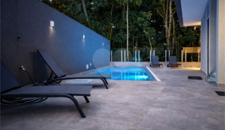 Casa à venda com 6 suítes no condomínio Riviera de São Loureço, Bertioga - SP