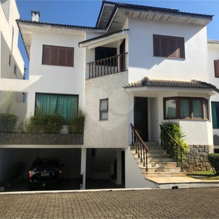 Casa à venda com 4 suítes no condomínio Vila das Emboabas, São Paulo - SP