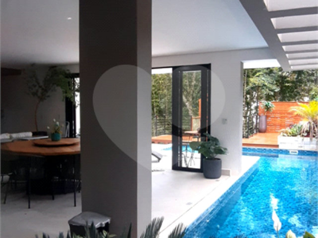 Casa à venda com 4 suítes no condomínio Jardim Itatinga, São Paulo - SP