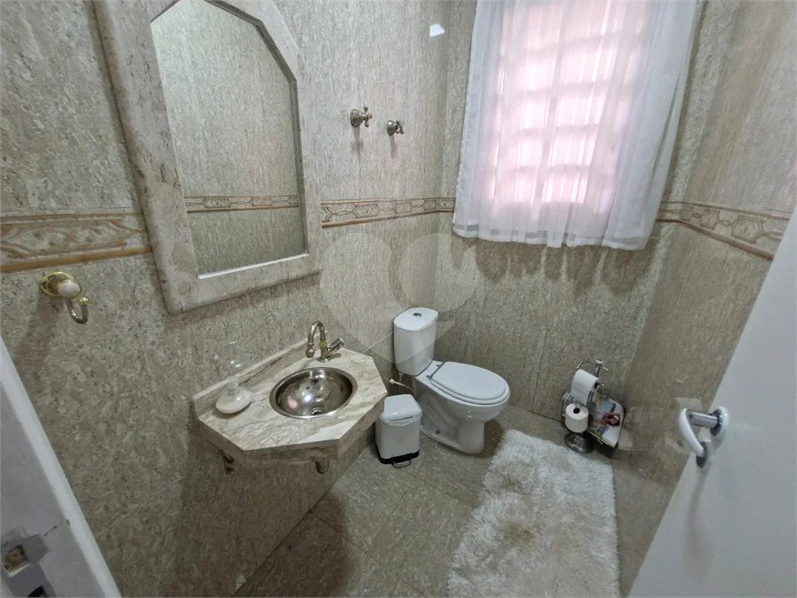 Casa à venda com 4 suítes no condomínio Villa Viana II, Cotia - SP