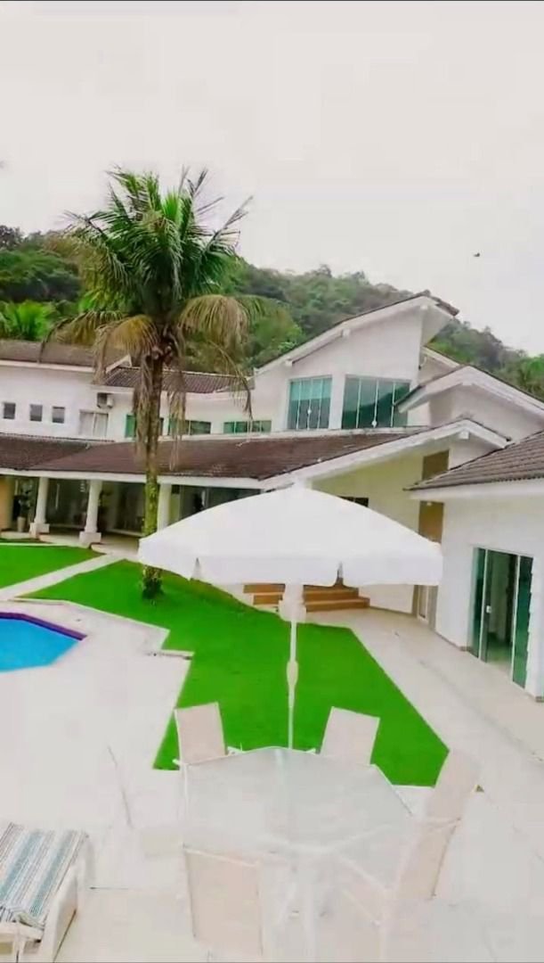 Casa com 5 dormitórios à venda, 900 m² por R$ 15.200.000,00 - Cidade Jardim Tom - Guarujá/SP