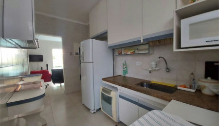 Apartamento Residencial à venda, Jardim Três Marias, Guarujá - AP1018.