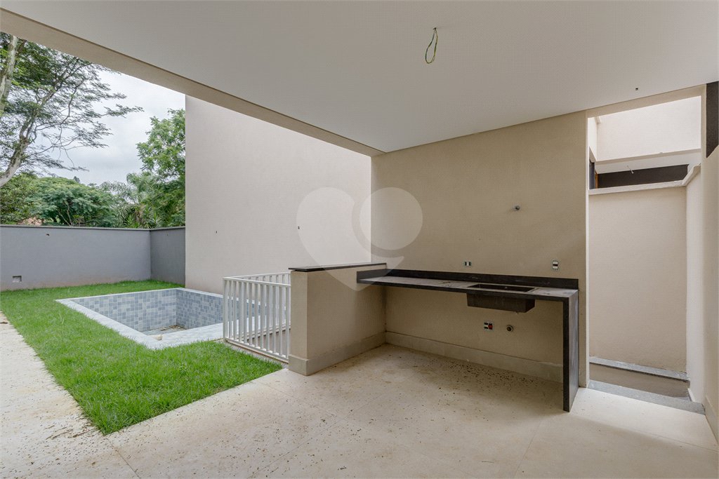 Casa à venda com 4 suítes no condomínio Garda, São Paulo - SP