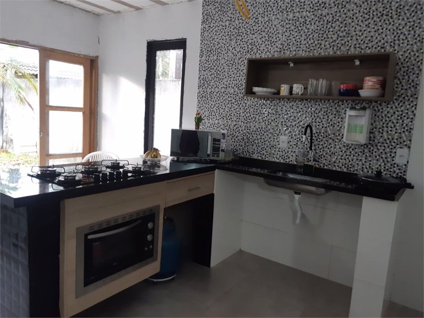 Casa com 4 dormitórios à venda, 180 m² por R$ 650.000,00 - Jardim Virginia - Guarujá/SP