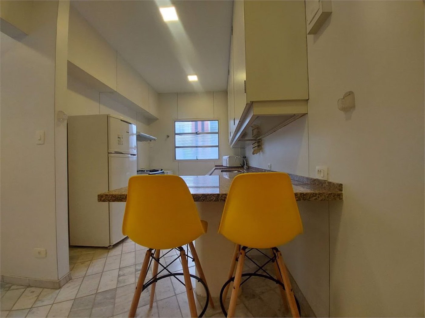 Apartamento com 4 dormitórios à venda, 120 m² por R$ 700.000,00 - Pitangueiras - Guarujá/SP