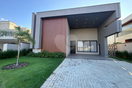 Casa à venda com 4 suítes no condomínio Alphaville Nova Esplanada 4, Votorantim - SP