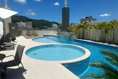 Apartamento à venda ou para alugar com 2 suítes em Itacorubi, Florianópolis, SC